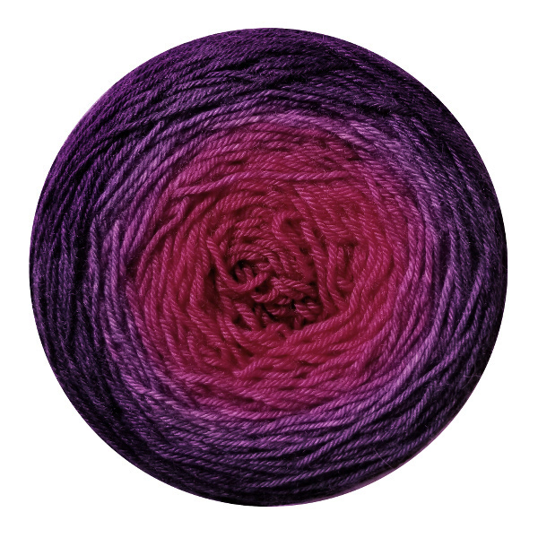 A yarn cake in a gradient from inquisitive raspberry in the center to mysterious mulberry on the outside.